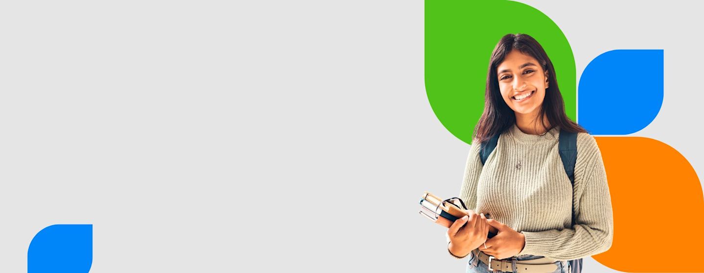 IDP student smiling with books in her hand, representing international education opportunities